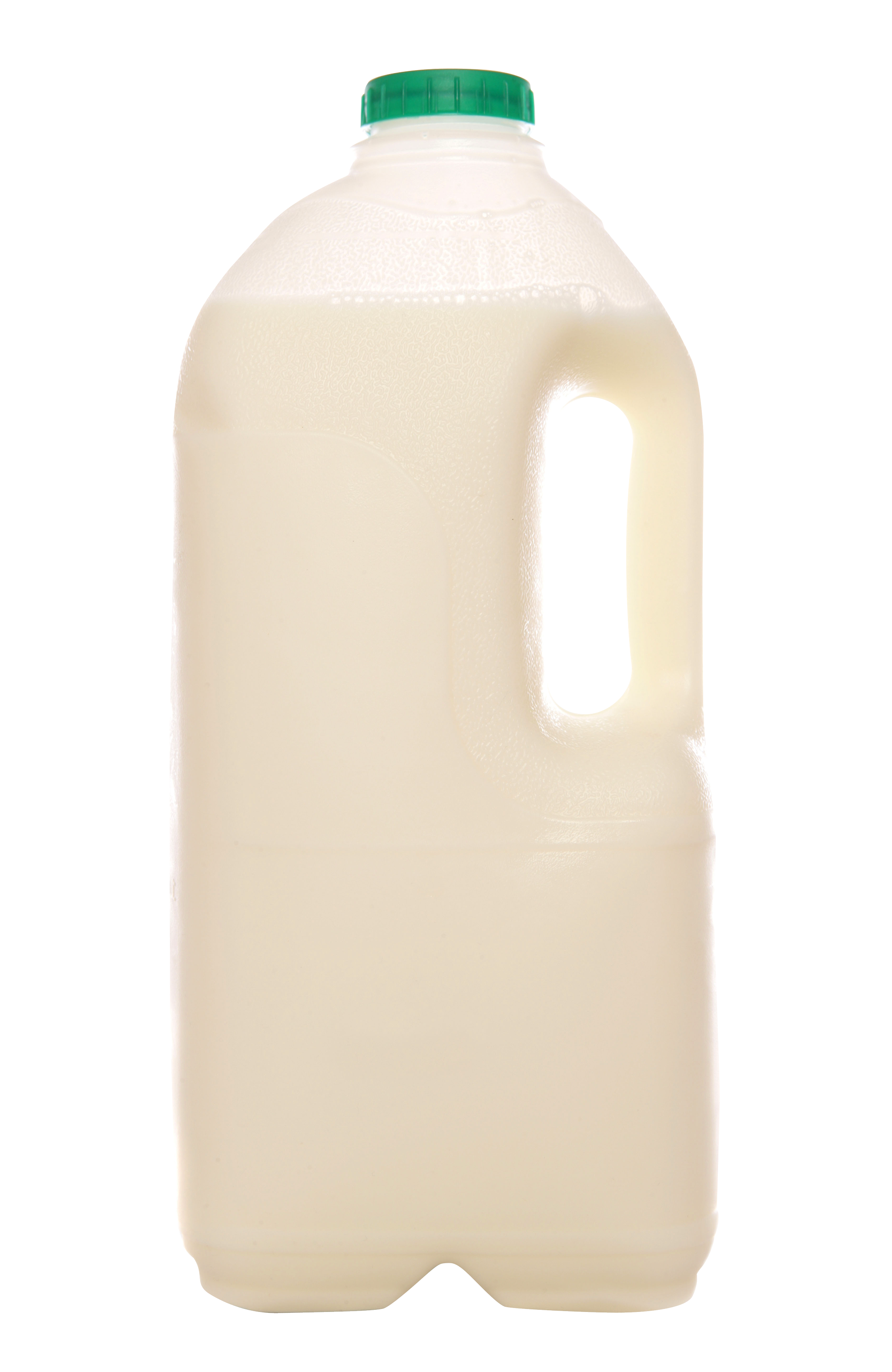 A Jug Of Milk With A Black Background