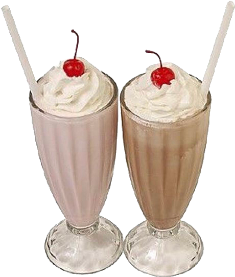 Two Glasses With Milkshakes And A Cherry On Top