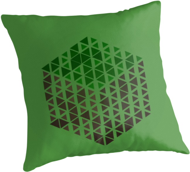 A Green Pillow With A Cube Design On It