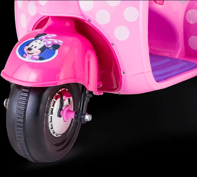 A Pink Scooter With A Cartoon Character On It