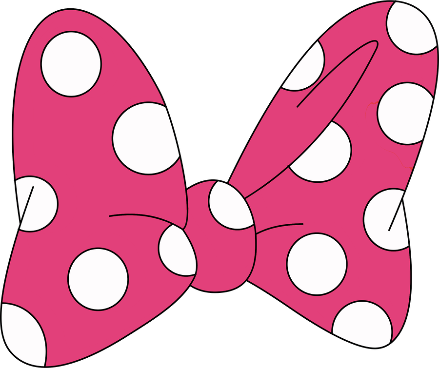 A Pink Bow With White Dots