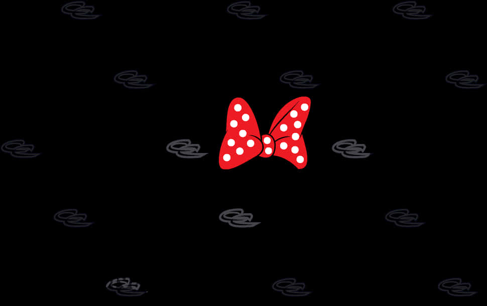 A Red Bow With White Dots On A Black Background