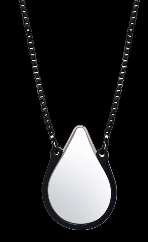 A Necklace With A Silver And Black Frame