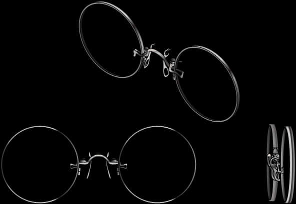A Pair Of Round Metal Glasses