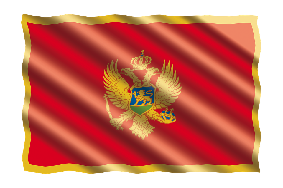 A Red Flag With A Gold Emblem