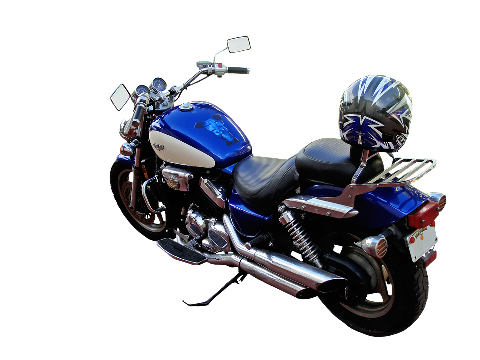 A Blue Motorcycle With A Helmet On Its Back