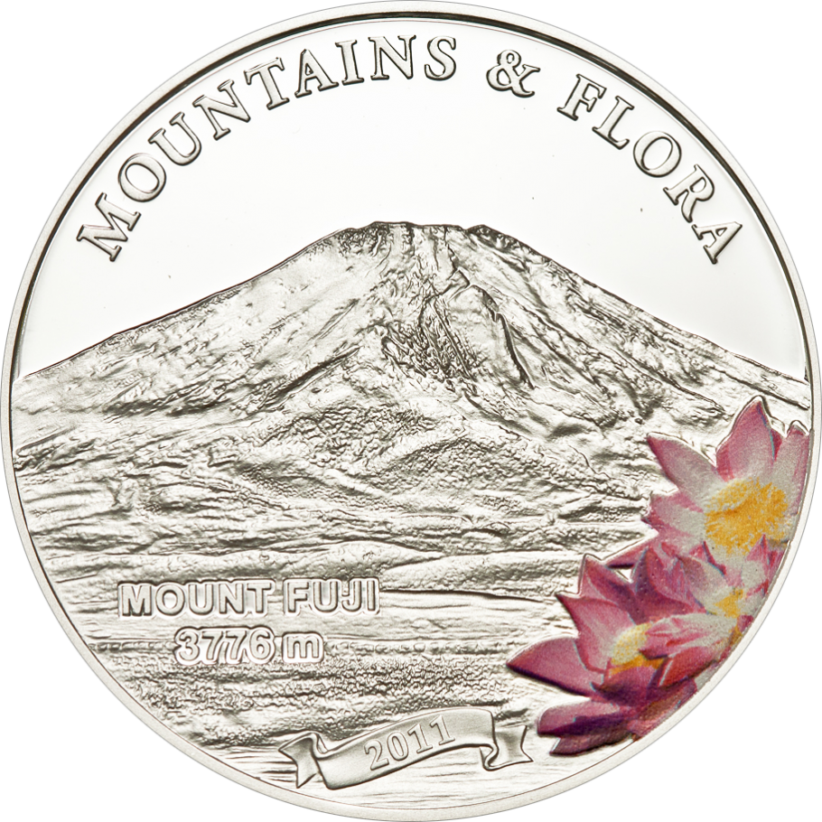 A Silver Coin With A Mountain And Flowers