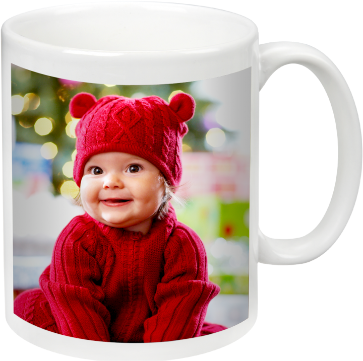 A Mug With A Baby In A Red Sweater And Hat