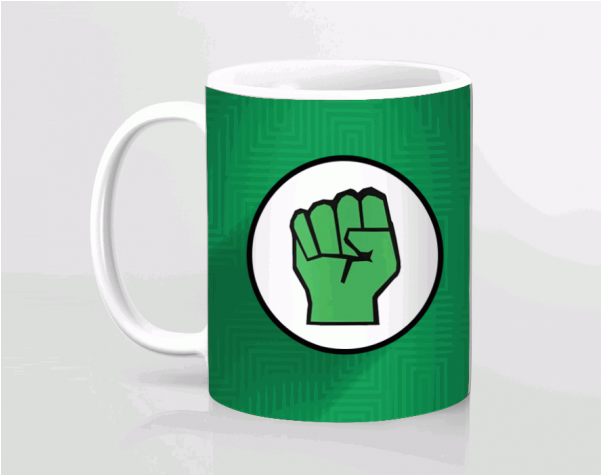 A Green Mug With A Fist On It