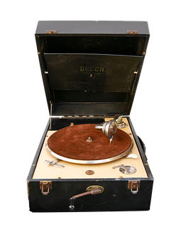 A Record Player With A Brown Disc