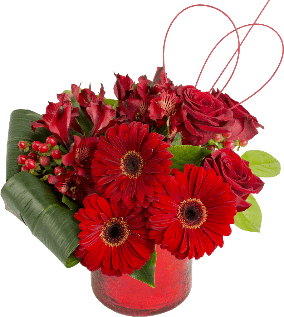 A Red Flower Arrangement In A Red Vase