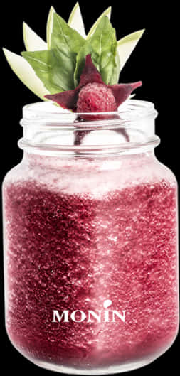 A Glass Jar With A Red Liquid And Fruit