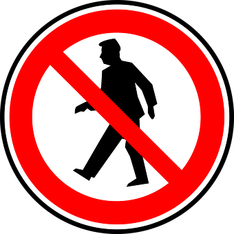 A Red And White Sign With A Man Walking