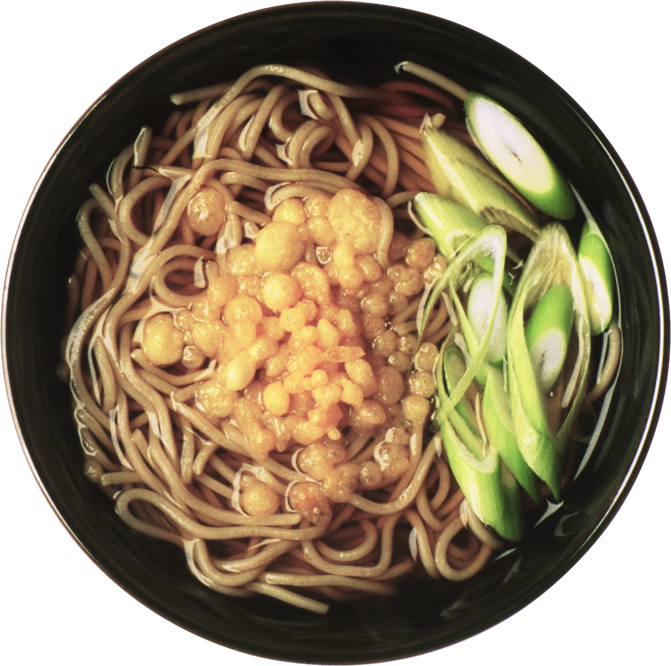 A Bowl Of Noodles And Vegetables