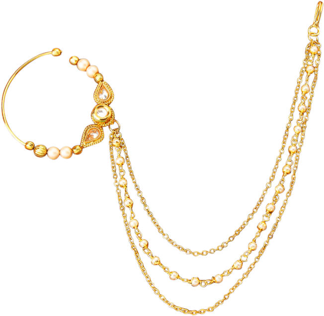 A Gold Chain With A Ring And Earring
