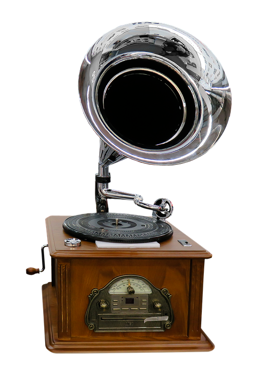 A Record Player With A Silver Horn On Top Of It