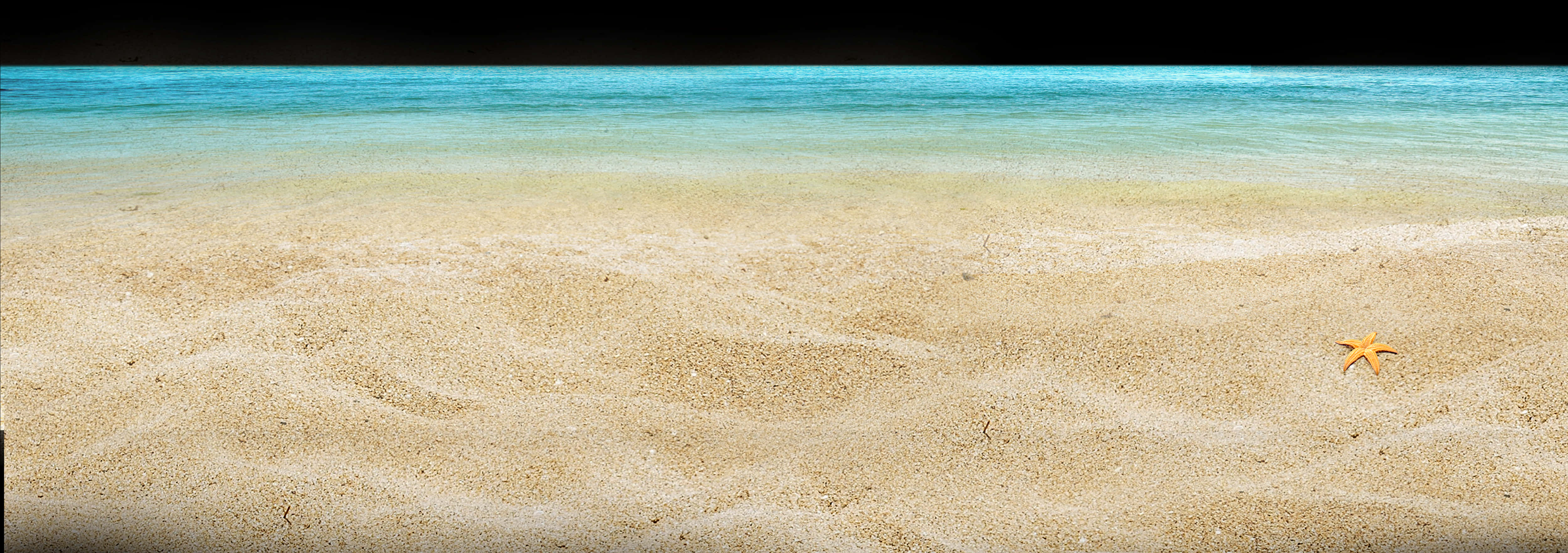 A Sandy Beach With Blue Water