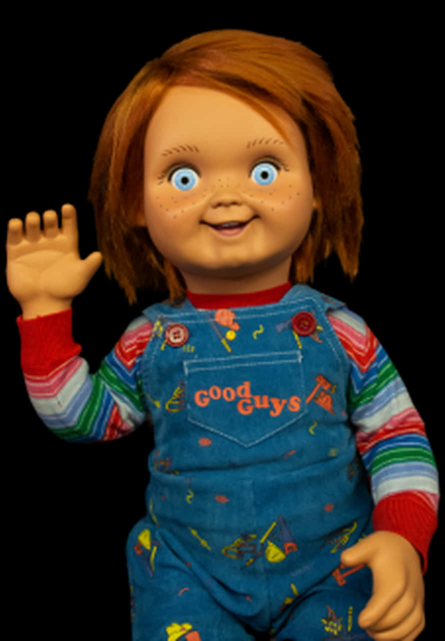 A Doll With Red Hair And A Striped Shirt And Overalls