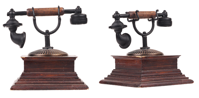 A Pair Of Antique Telephones