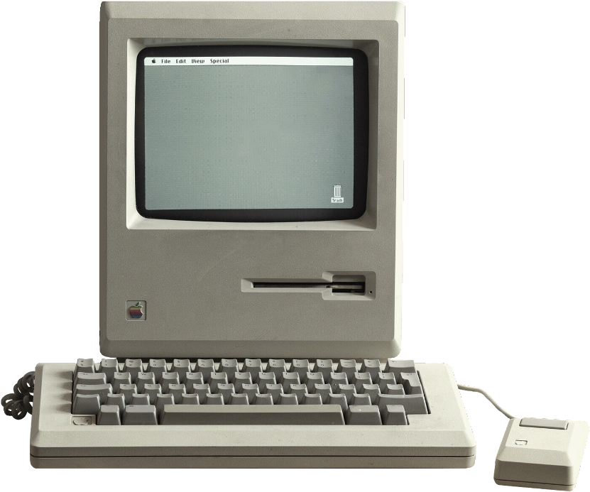An Old Computer With A Mouse And Keyboard