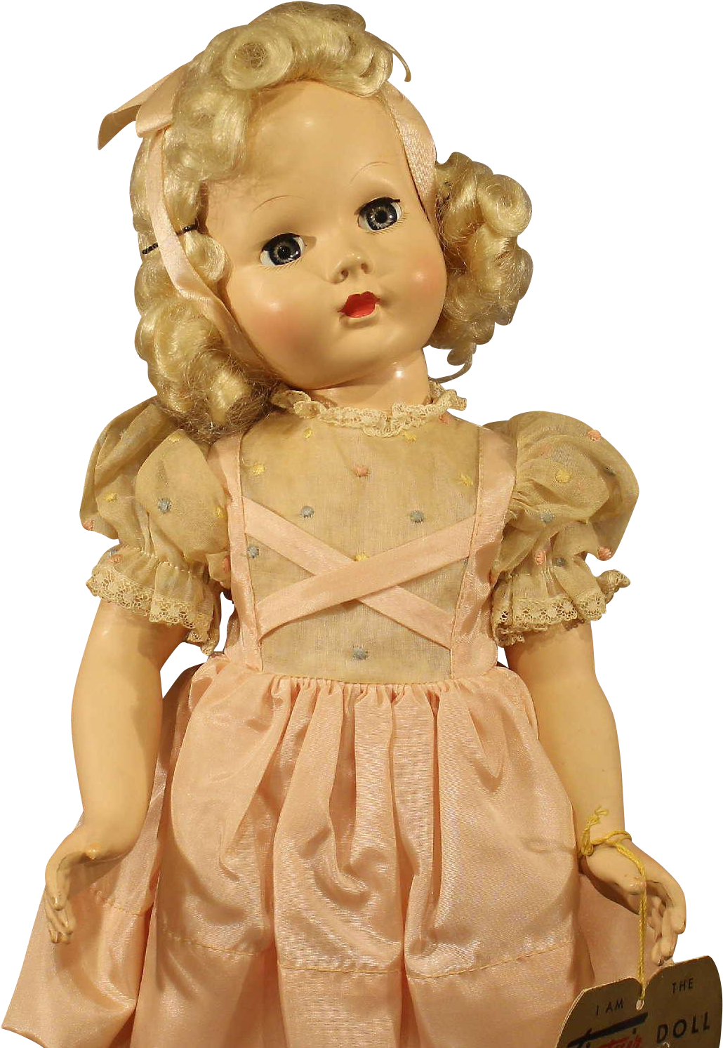 A Doll In A Pink Dress