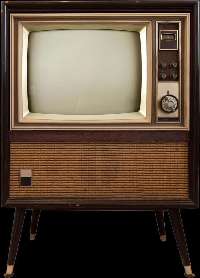 An Old Television With A Wicker Basket