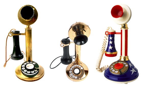 A Group Of Telephones On A Black Background