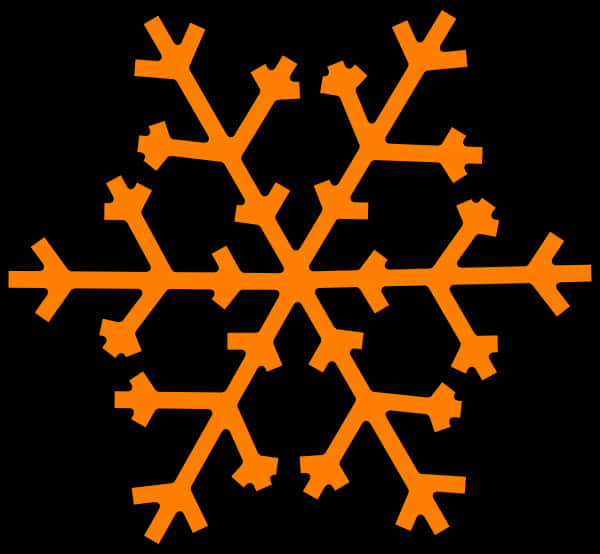 A Orange Snowflake On A Black Background