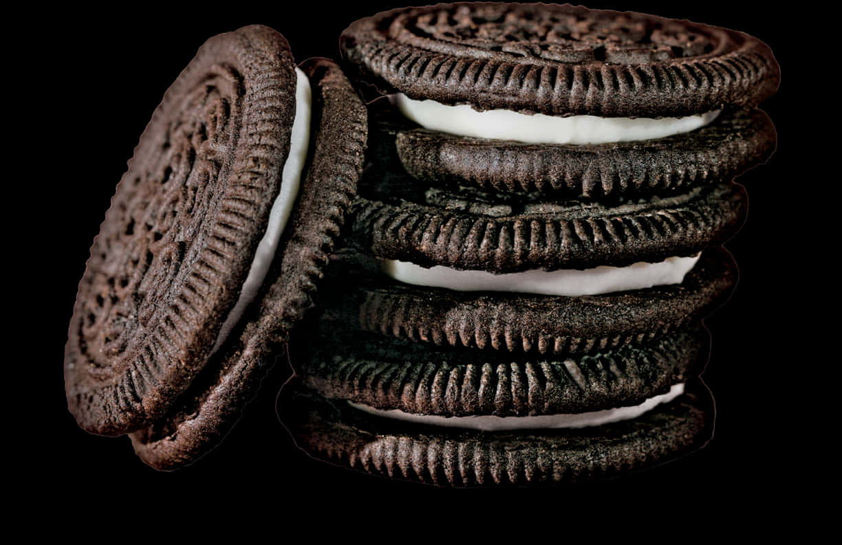A Stack Of Cookies With White Filling