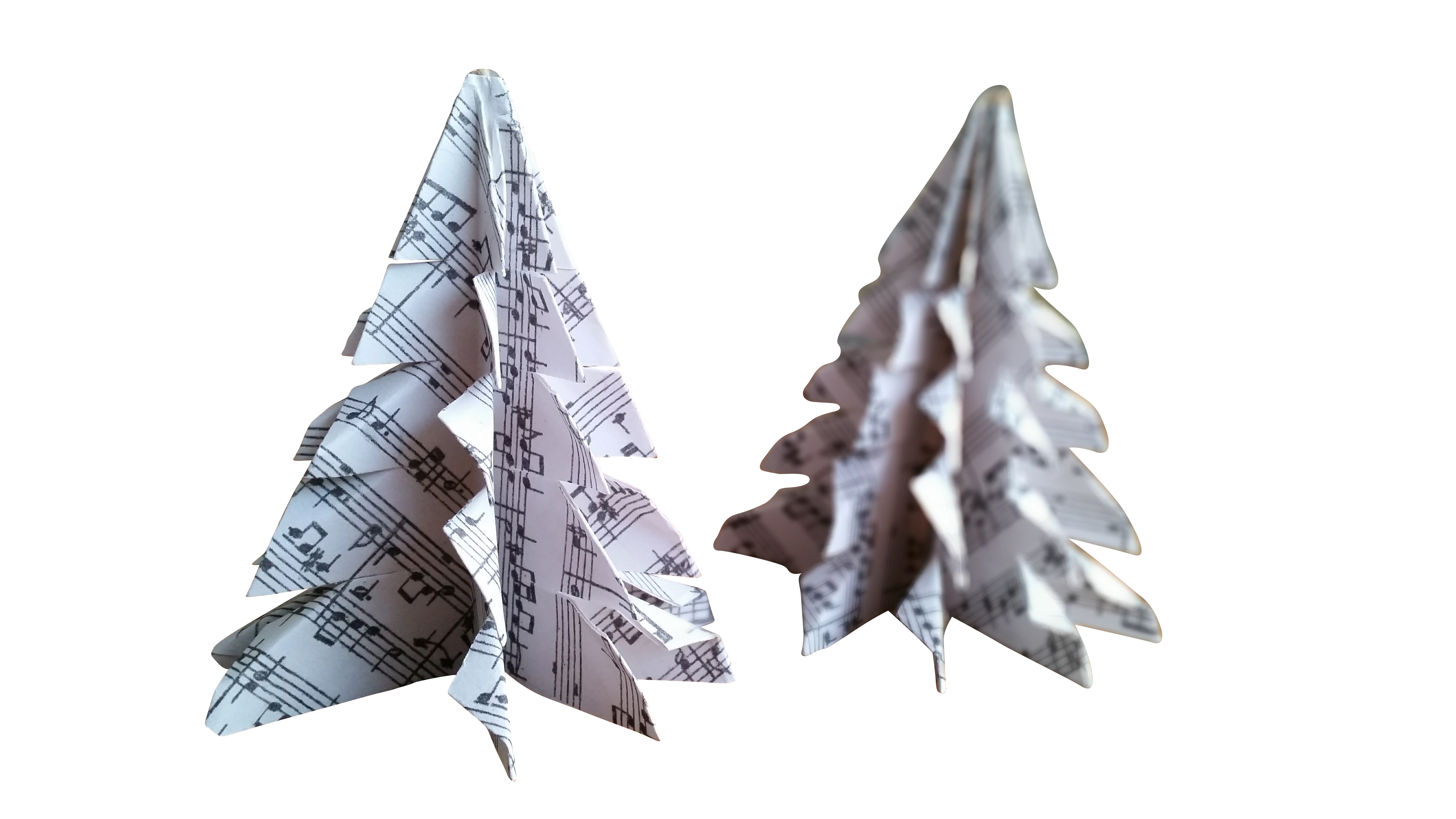 A Paper Christmas Trees Made Of Music Sheets