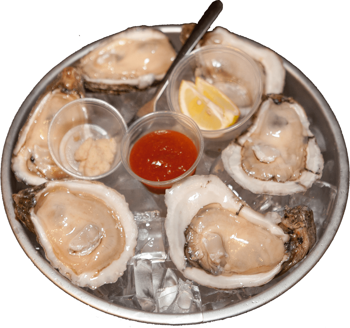 A Plate Of Oysters And Sauces