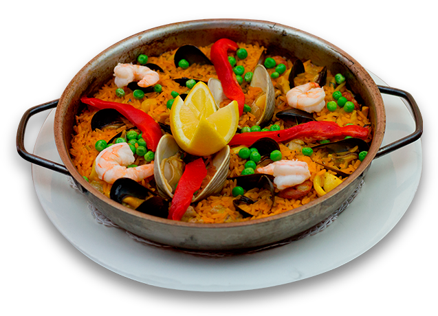 A Pan Of Rice With Seafood And Lemon Wedges