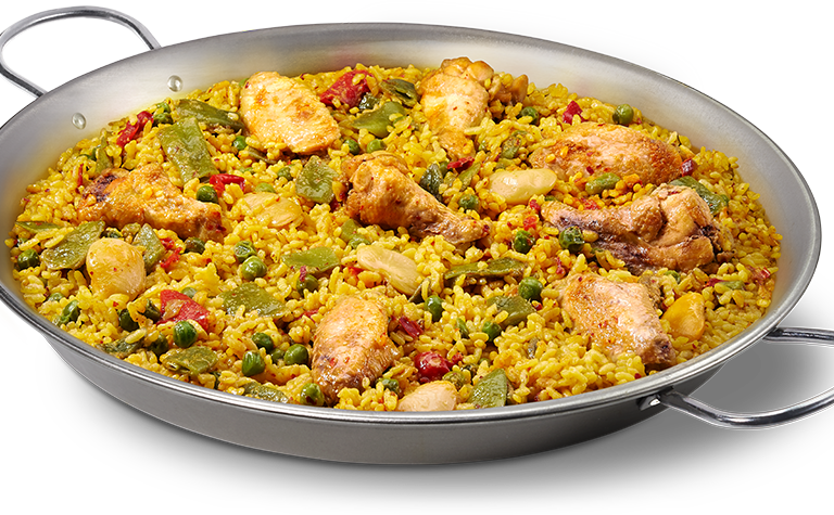 A Pan Of Rice With Chicken And Vegetables