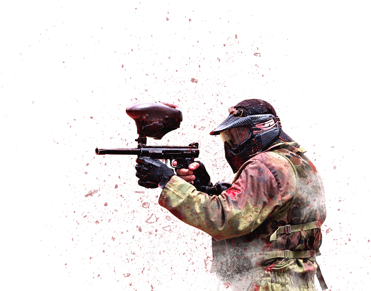 A Person In Paintball Gear Holding A Gun