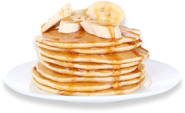 A Stack Of Pancakes With Bananas And Syrup On Top