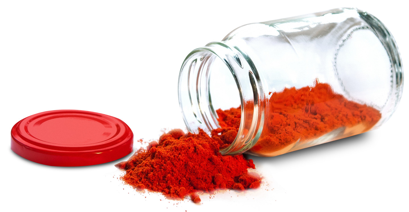 A Jar With Red Powder Spilling Out Of It