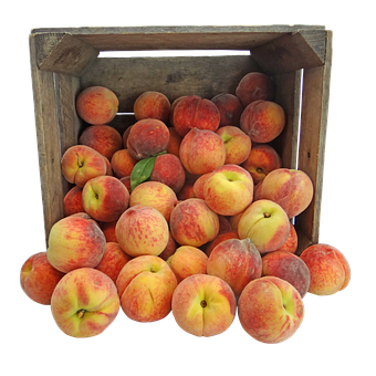 A Wooden Box Full Of Peaches