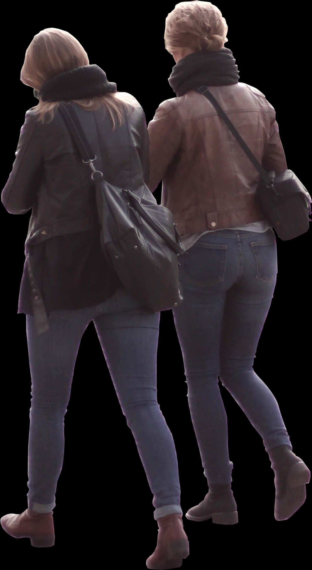Two Women Standing Together With Their Hands On Their Hips