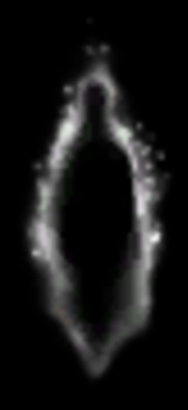 A Blurry Image Of A Person's Body