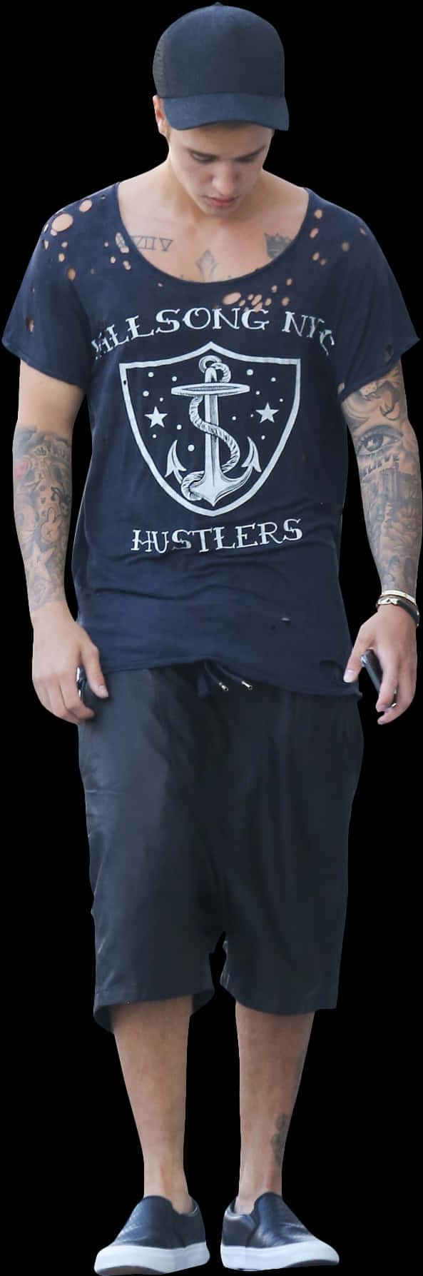 A Man With Tattoos On His Arm