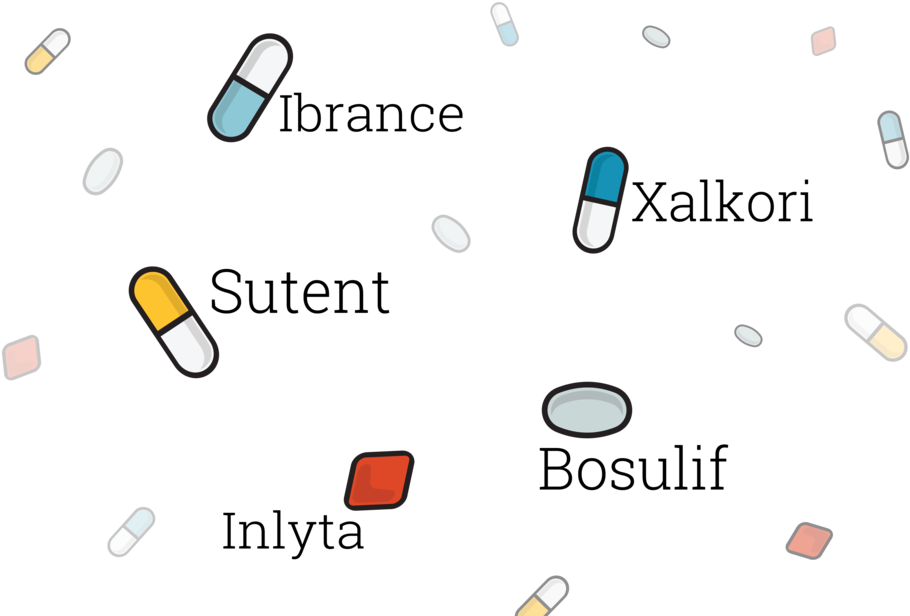 A Group Of Pills On A Black Background