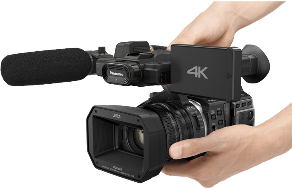 A Hand Holding A Video Camera
