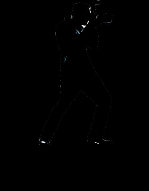 A Silhouette Of A Man In A Suit