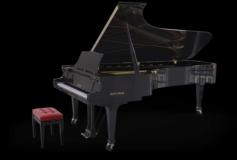 A Black Piano With A Red Seat