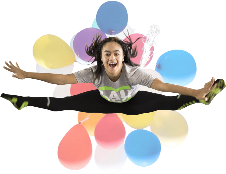 A Girl Jumping In The Air With Balloons Behind Her