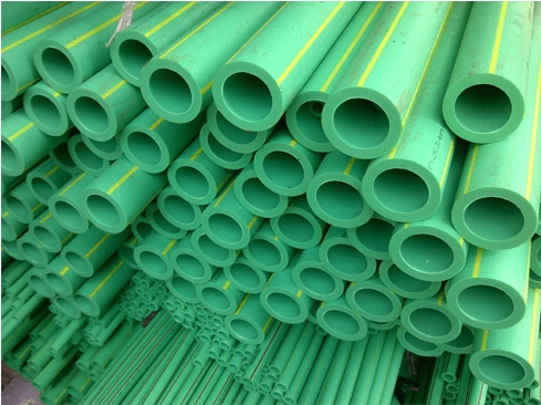 A Stack Of Green Pipes