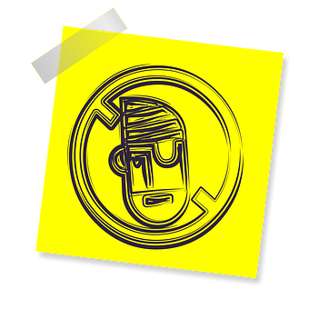 A Yellow Sticker With A Drawing Of A Face