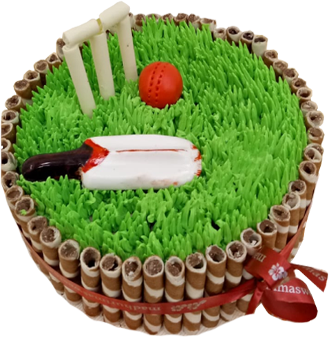 A Cake Decorated With Grass And A Ball