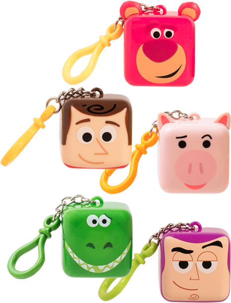 A Group Of Key Chains With Faces