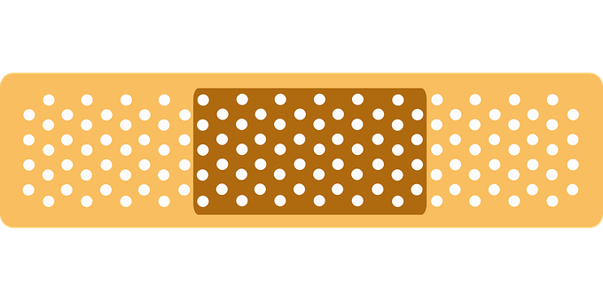 A Band Aid With White Dots